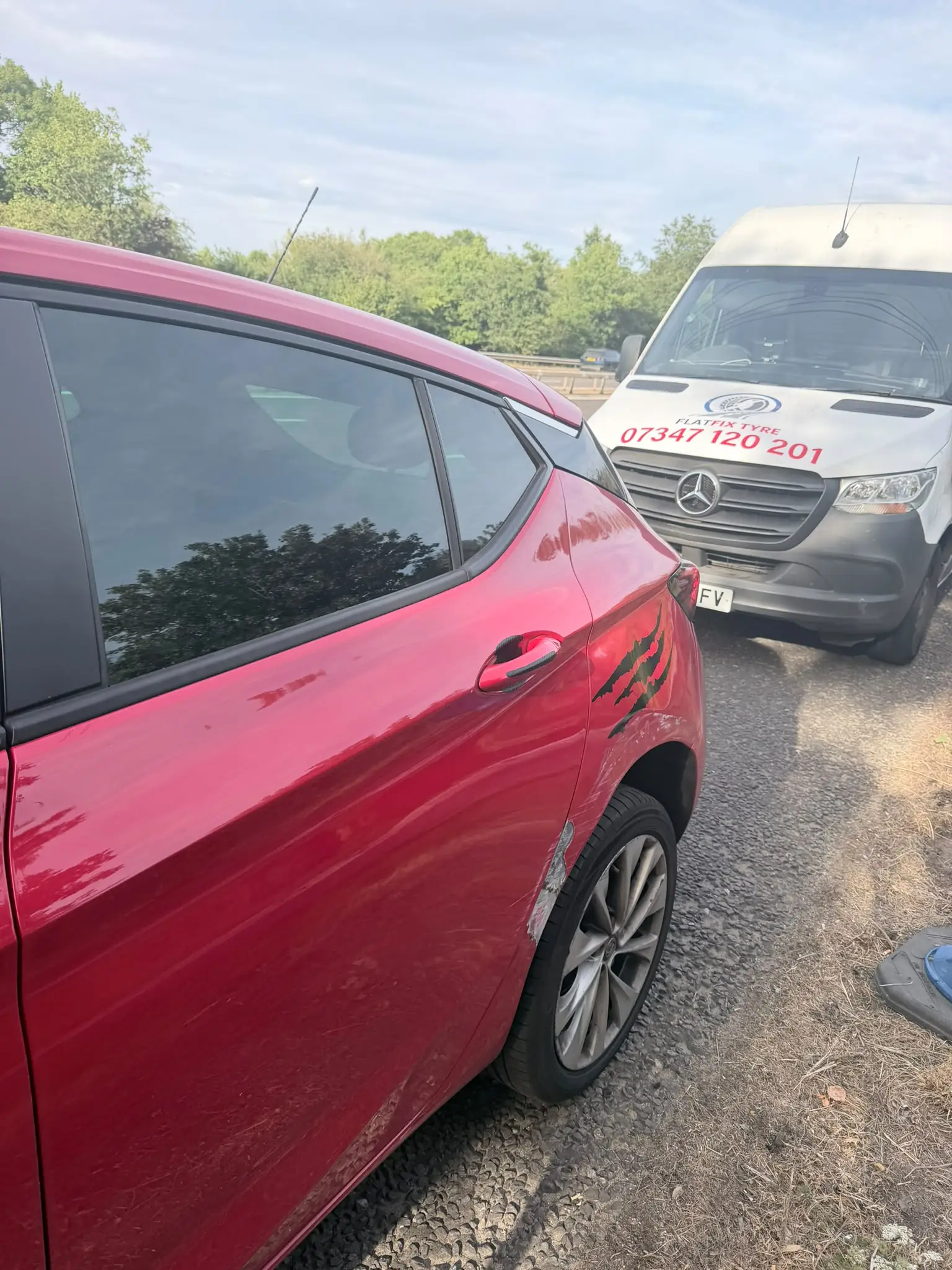 FlatFix mobile tyre van helping a customer in London