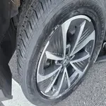 Precision fitted car tyre on multispoke alloy wheel in London