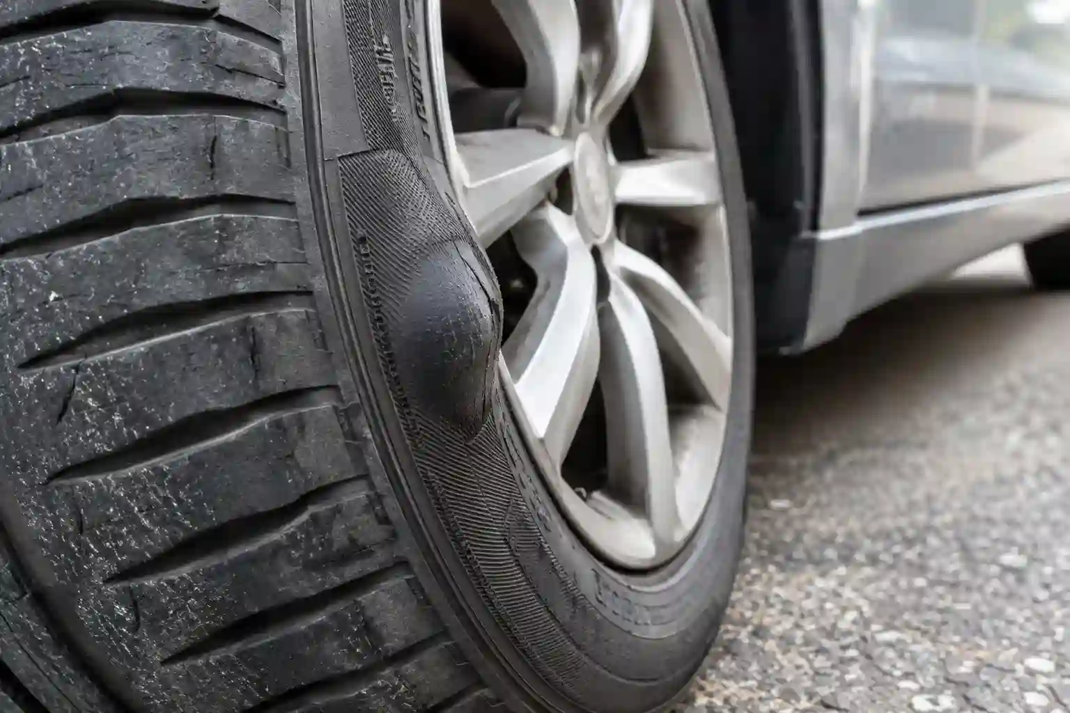 Bulge on a car tyre sidewall that can cause vibration while driving